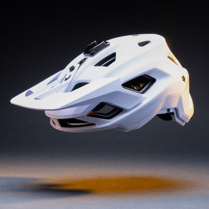 White mountain bike helmet with the curved helmet mount base attached, front three-quarter view