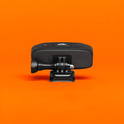 Portal bike helmet light rear view on its helmet mount, showing the action camera style mounting tabs