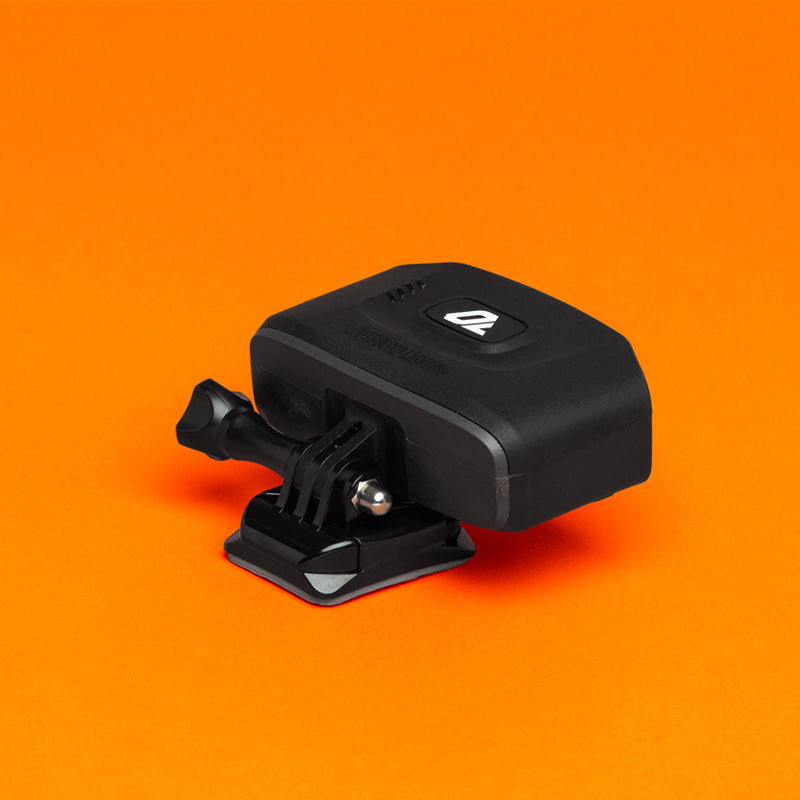 Portal bike helmet light on a curved helmet mount, rear three-quarter view