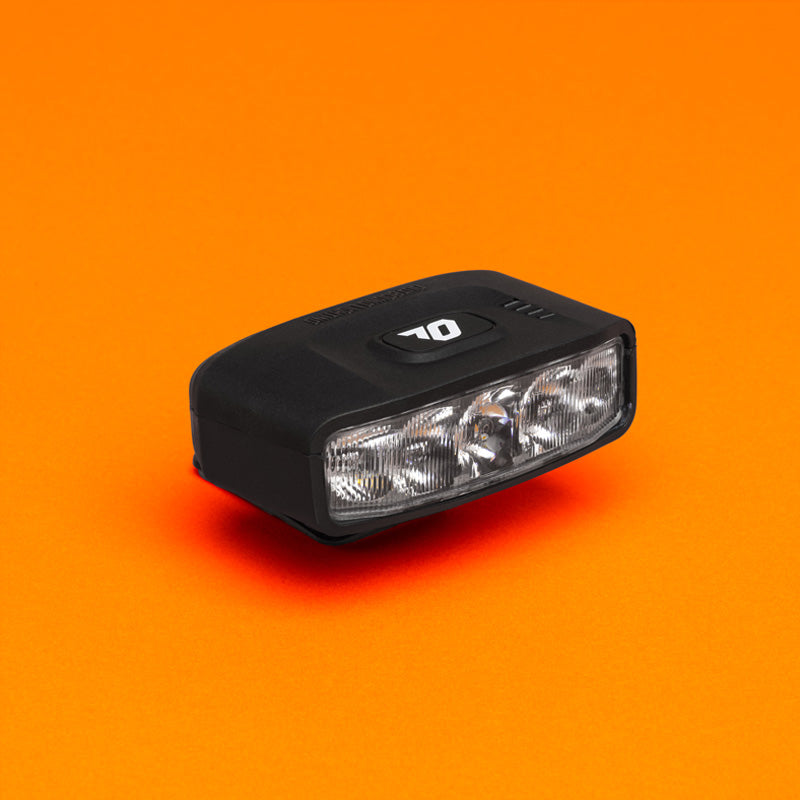 Outbound Lighting Portal helmet light, front three-quarter view