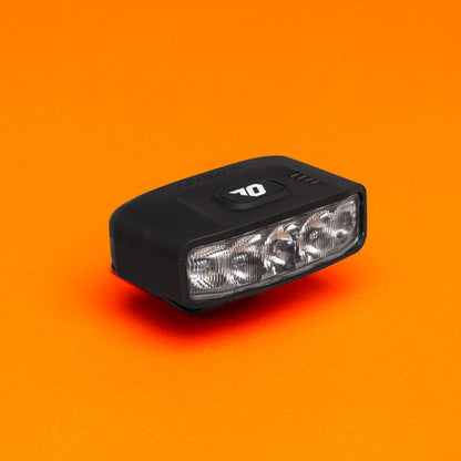 Outbound Lighting Portal helmet light, front three-quarter view