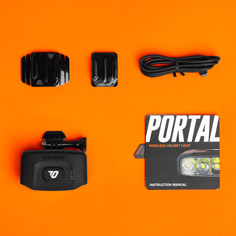 Outbound Lighting Portal with included helmet mounts and USB charging cable